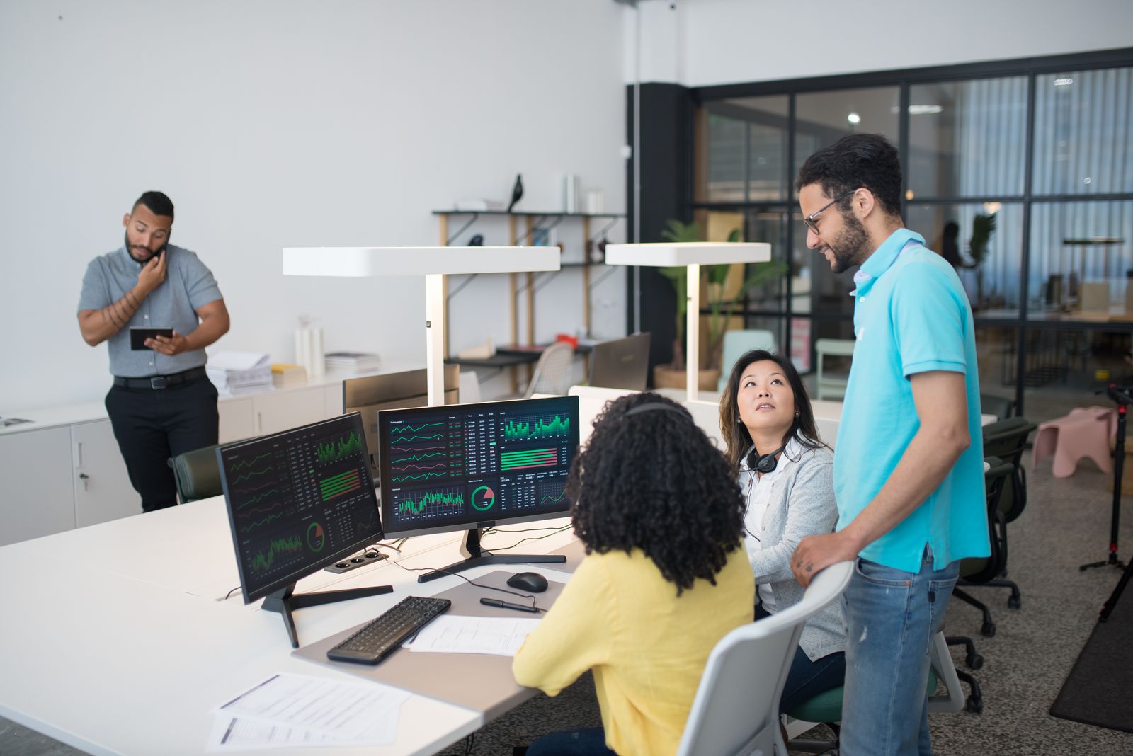 Technology team collaborating in a modern office